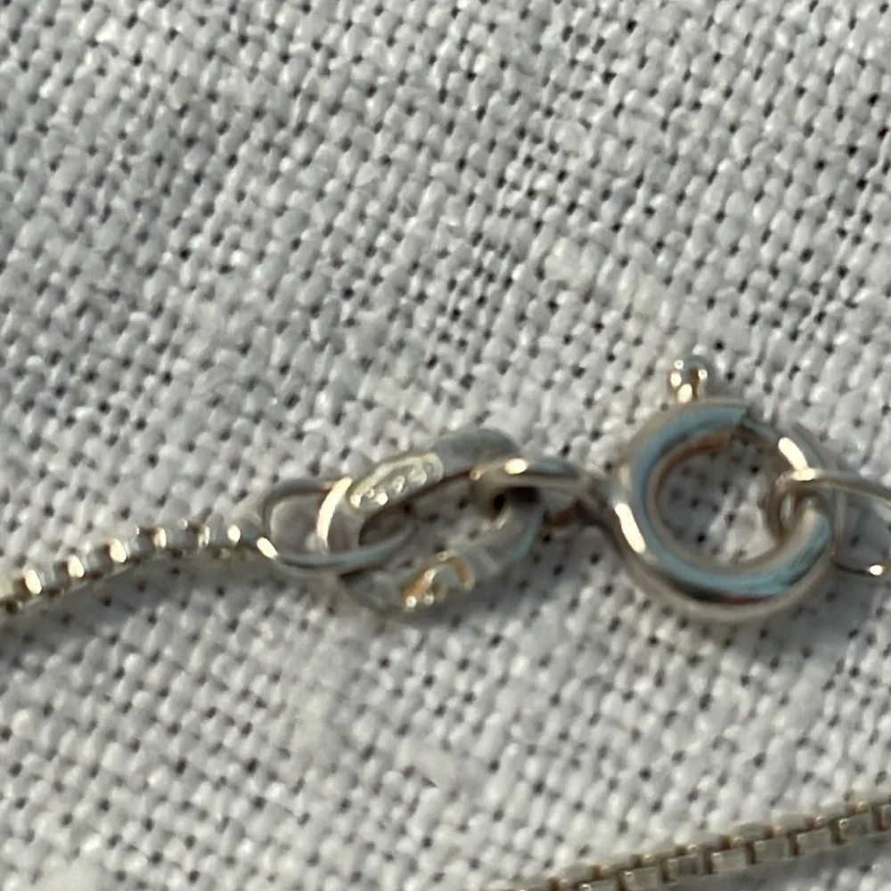 Three Hearts Necklace with Locket Chain is 925 Silver